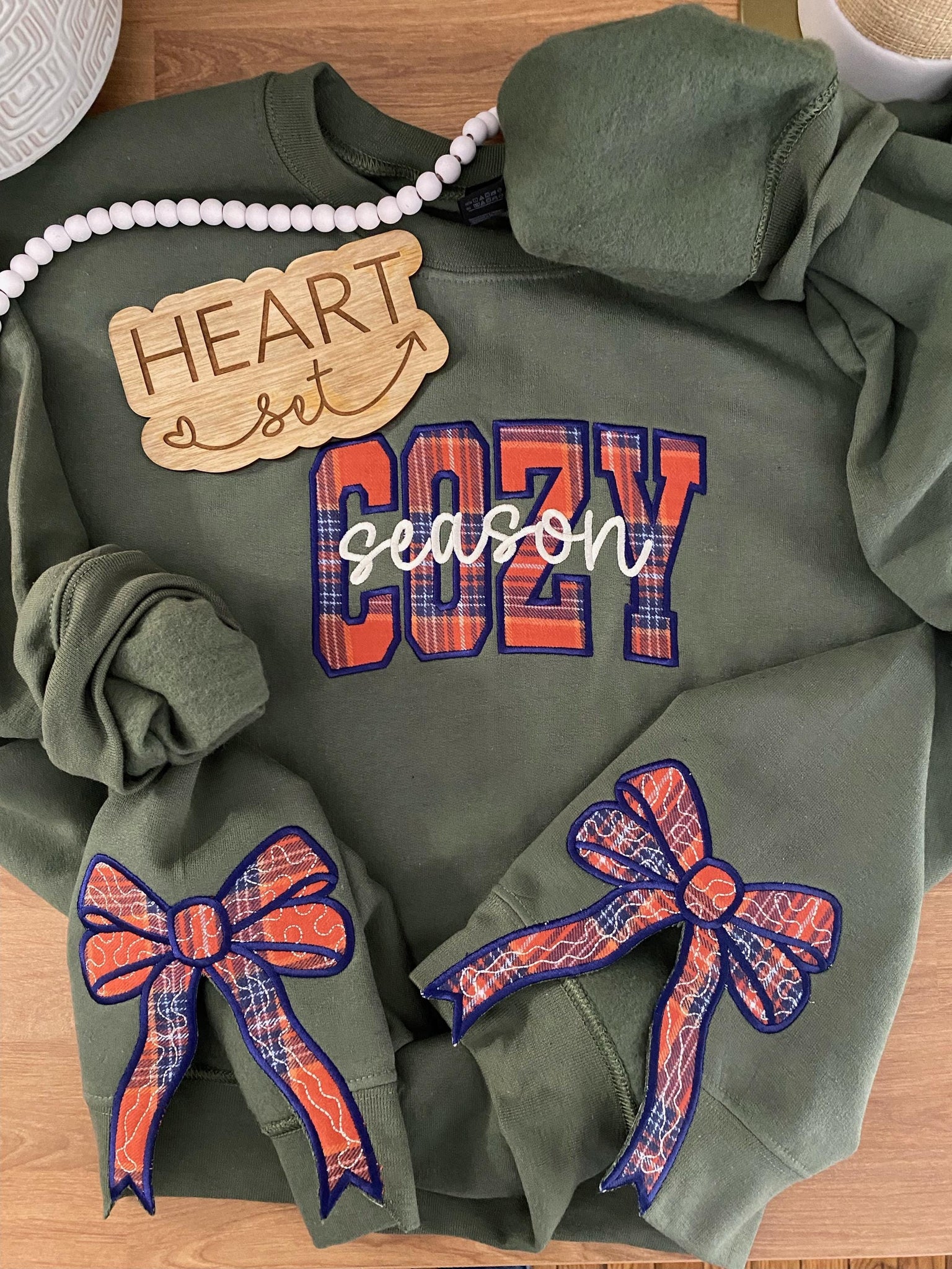 Cozy Season Side Bow Cut-Out Sweatshirt  Plaid Fall Pullover Trendy Coquette Bow  Cozy Season  Plaid Side Bow  Bow Cut-Out Sweatshirt  ESIBOW