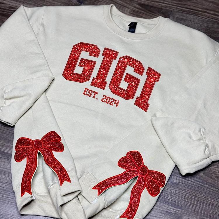 Glitter Gigi Est Claus Embroidered Mimi, Grandma Christmas Bow Embellished Sweatshirt ? Custom Side Bow Cut-Out Sweatshirt, Christmas Gigi ESIBOW