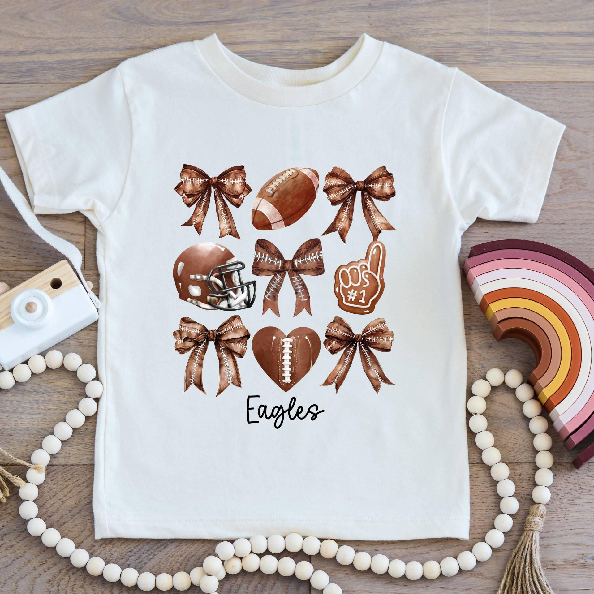 Personalized Kids Football Shirt with Coquette Bows,Custom Toddler Football T-Shirt,Youth Football Gameday Shirt,Cute Girls Football T-Shirt  CUSFB
